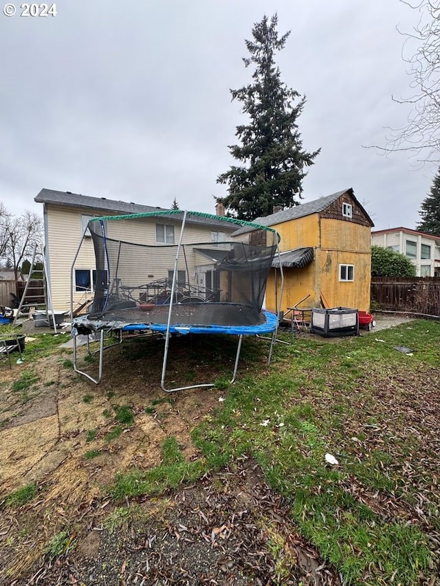 back of property with a trampoline