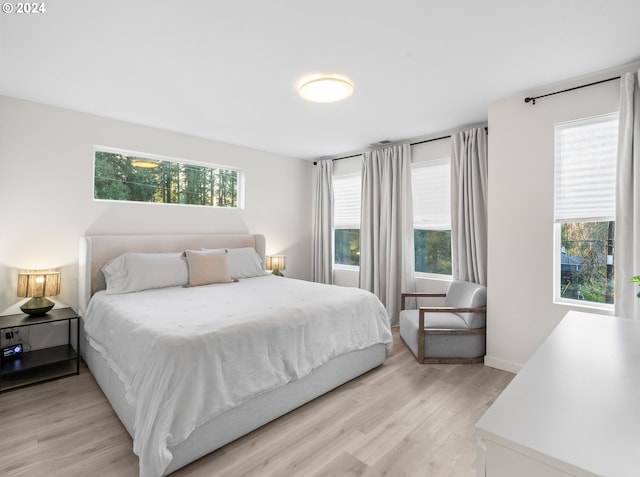 bedroom with light hardwood / wood-style flooring