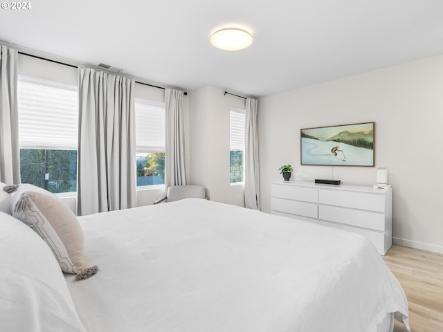 bedroom featuring light wood-type flooring