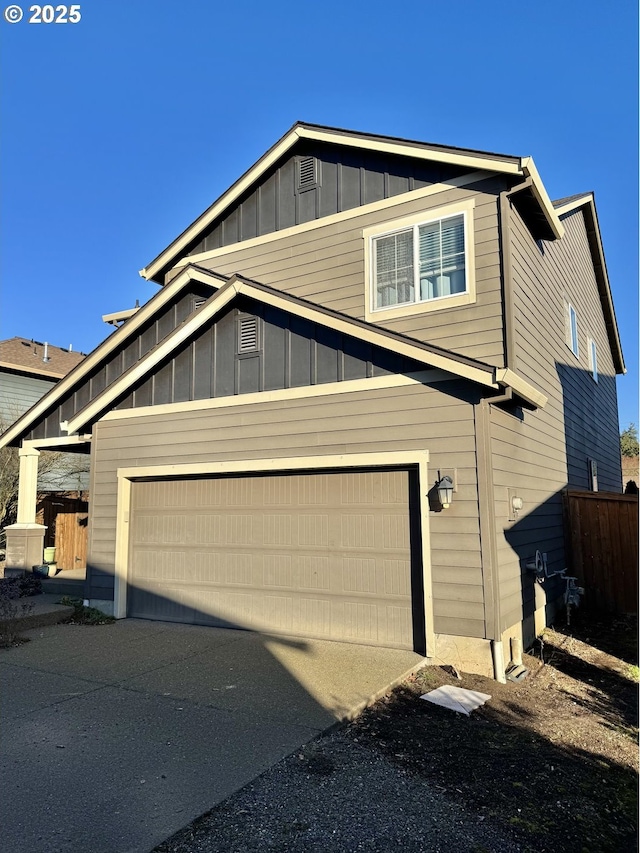 view of front of home with board and batten siding and driveway