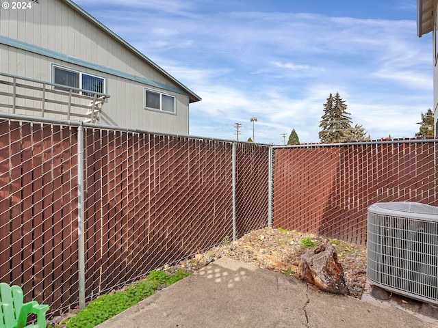 view of yard with central air condition unit