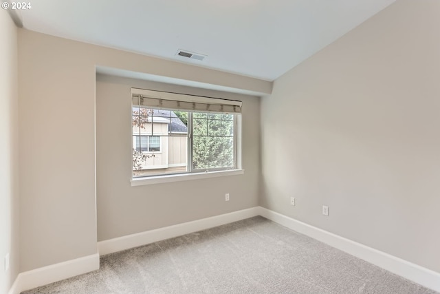 spare room with carpet floors