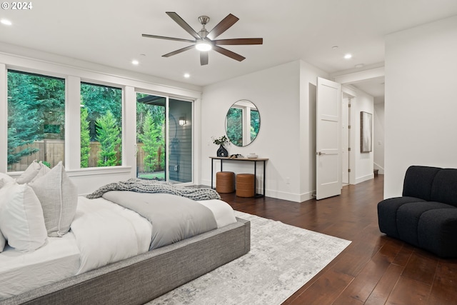 bedroom featuring ceiling fan and dark hardwood / wood-style flooring