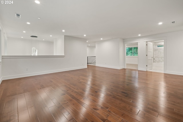 spare room featuring dark hardwood / wood-style floors