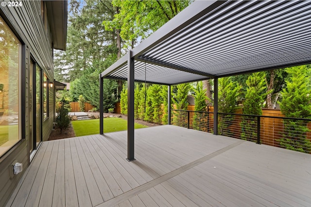 wooden terrace with a pergola and a yard