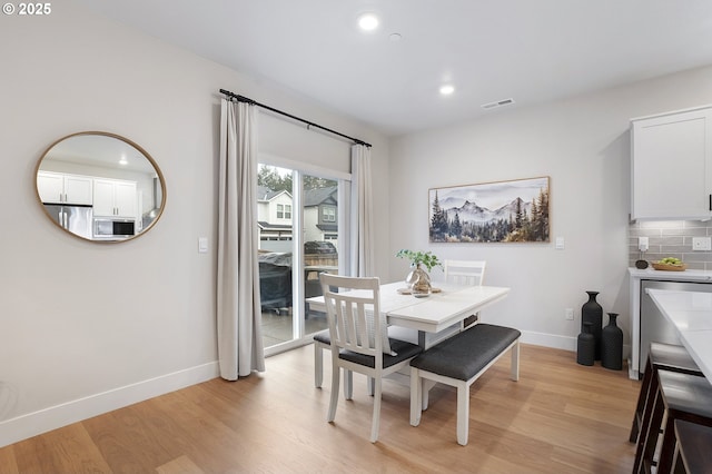 dining area featuring light hardwood / wood-style flooring