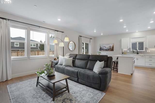 living room with light wood-type flooring