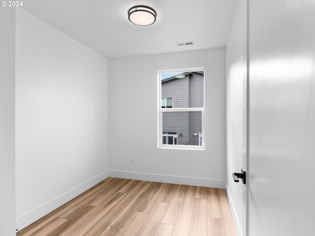 758 NE 91st Ave Unit 1, Portland, OR 97220 - unfurnished room with light wood-style flooring, baseboards, and visible vents