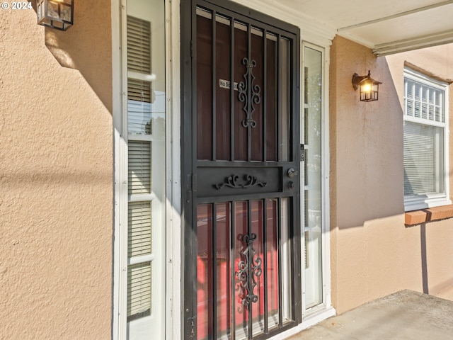 entrance to property with a porch