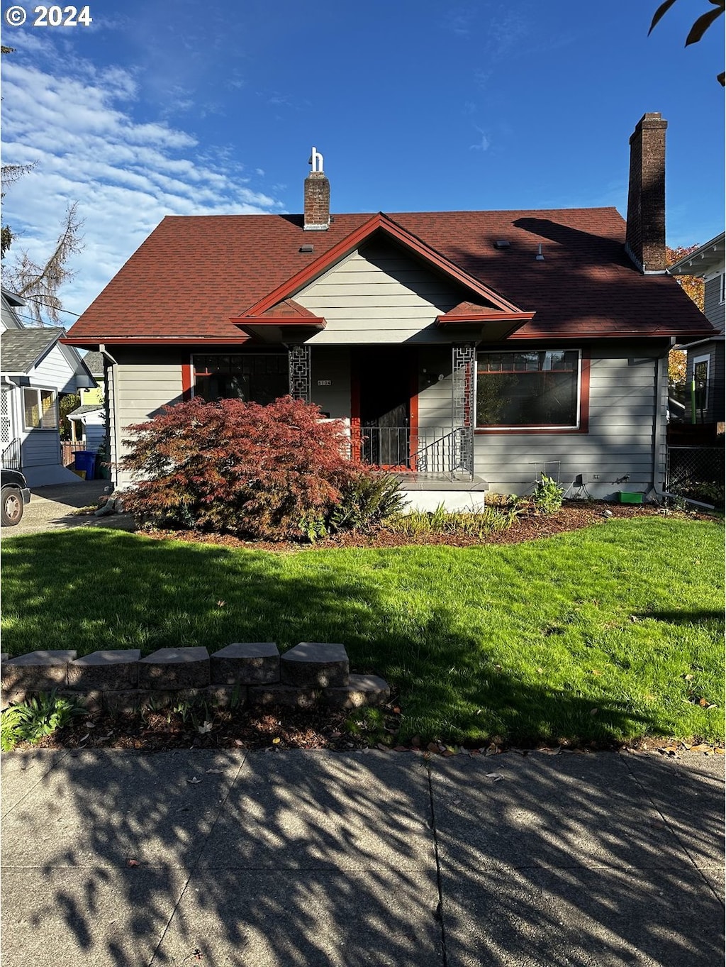 back of house with a yard