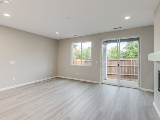 838 NW 178th Way, Ridgefield, WA 98642 - spare room featuring plenty of natural light, light wood finished floors, baseboards, and recessed lighting