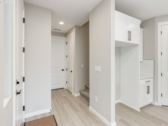 838 NW 178th Way, Ridgefield, WA 98642 - hallway featuring light wood finished floors, recessed lighting, baseboards, and stairs