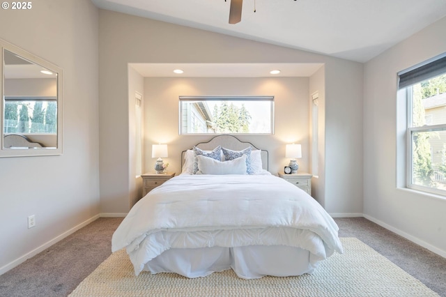 bedroom with lofted ceiling, carpet, and ceiling fan