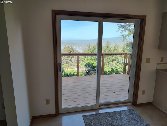 entryway featuring baseboards