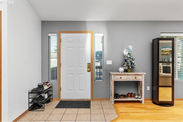 foyer with light tile patterned floors