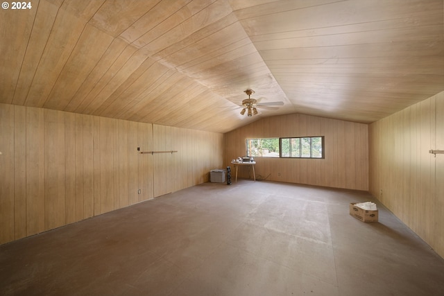 bonus room with wooden walls, ceiling fan, wood ceiling, and vaulted ceiling