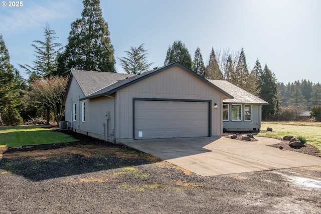 view of front facade featuring cooling unit, a garage, driveway, crawl space, and a front lawn