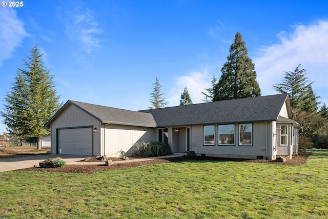 ranch-style house with a garage, a front yard, and concrete driveway