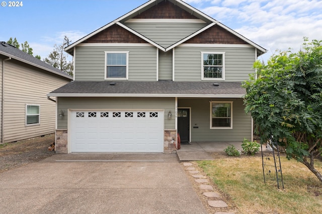 craftsman inspired home with a garage