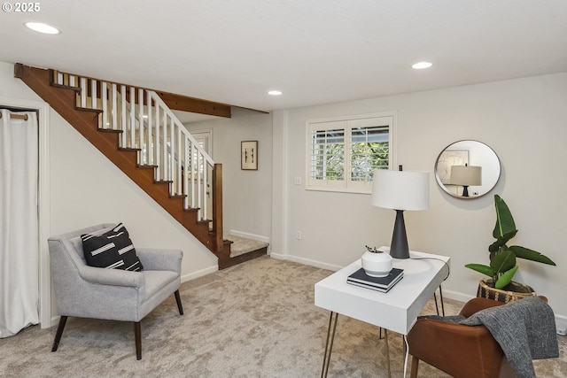 sitting room with stairway, carpet flooring, and recessed lighting