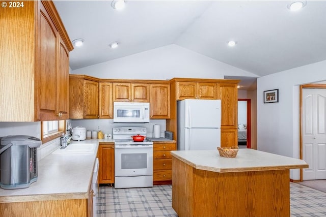 kitchen with a center island, white appliances, vaulted ceiling, and sink