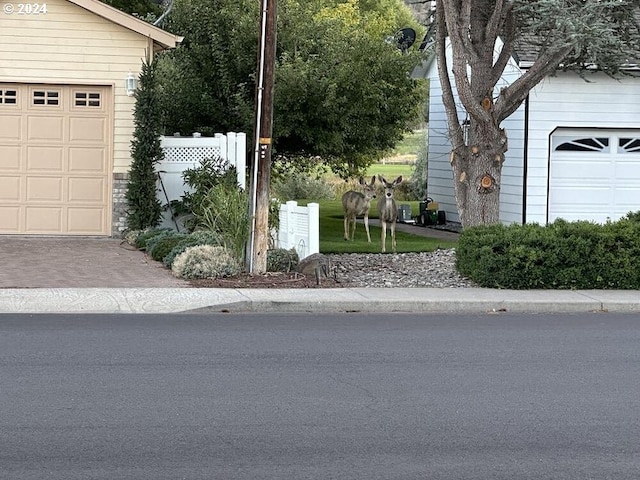 garage featuring fence