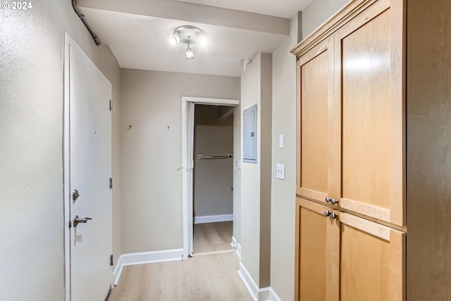 hall with light hardwood / wood-style floors