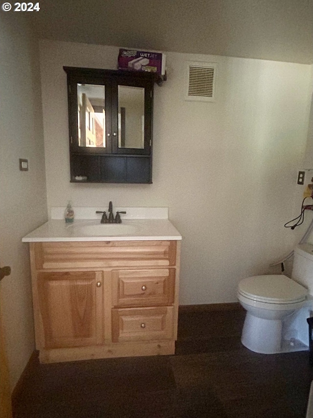 211 Jensen Quarry Rd, Bickleton, WA 99322 - bathroom with visible vents, toilet, and vanity