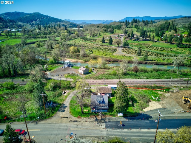 drone / aerial view featuring a mountain view