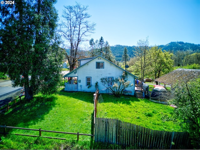 exterior space featuring a mountain view