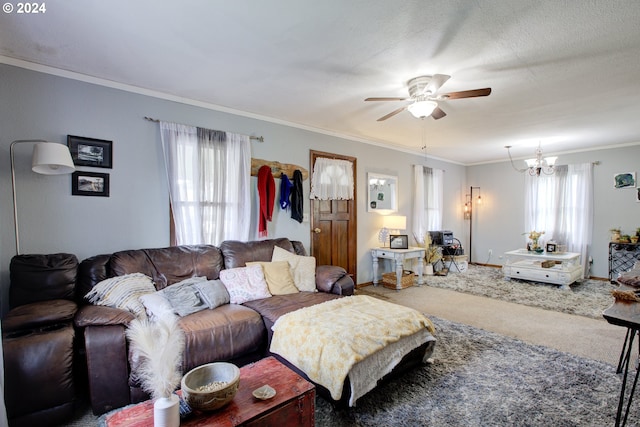 living room with ceiling fan with notable chandelier, ornamental molding, a textured ceiling, and carpet flooring