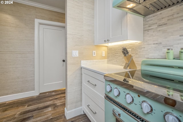 kitchen featuring electric stove, white cabinetry, dark hardwood / wood-style floors, and custom range hood