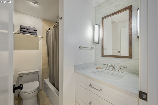 full bathroom with vanity, toilet, and shower / bath combo