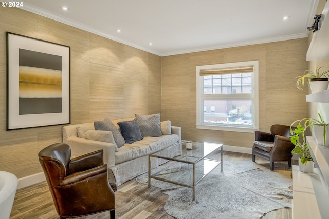 living room featuring wood-type flooring and ornamental molding