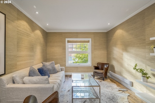 living room with crown molding and hardwood / wood-style flooring