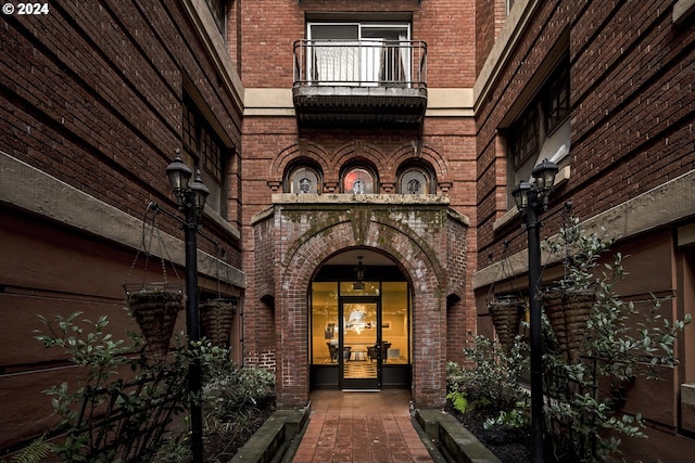 1829 NW Lovejoy St Unit 303, Portland, OR 97209 - entrance to property with a balcony and brick siding