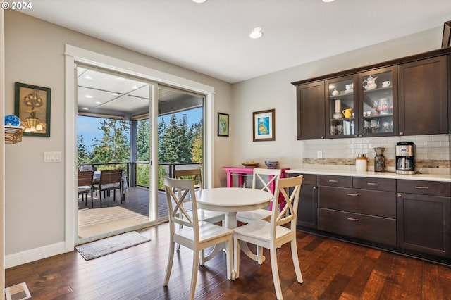 dining room featuring dark wood-type flooring