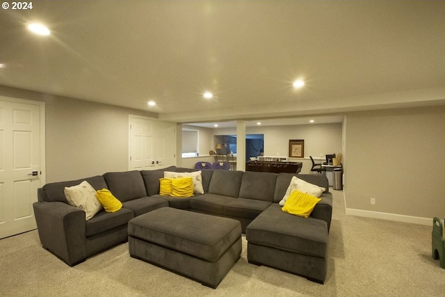 living room featuring light carpet