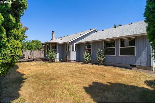 ranch-style home with a front yard