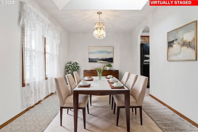 dining area with a chandelier