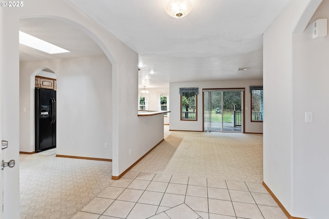 corridor with light carpet