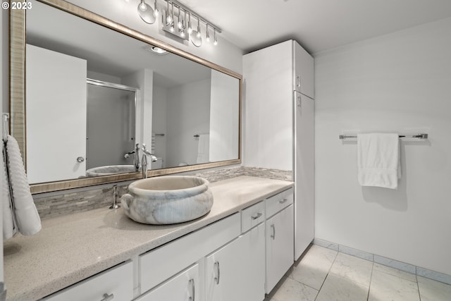 bathroom with tile floors and oversized vanity