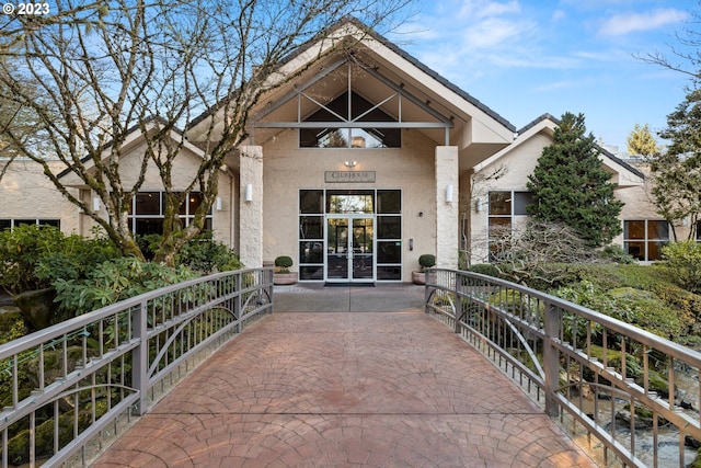 entrance to property featuring french doors