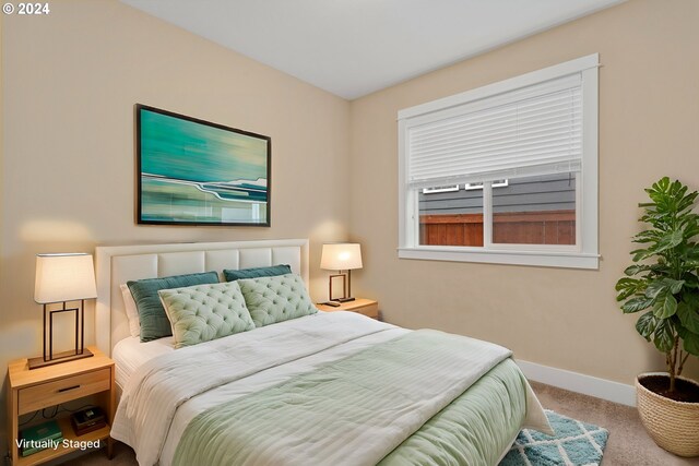 bedroom featuring carpet