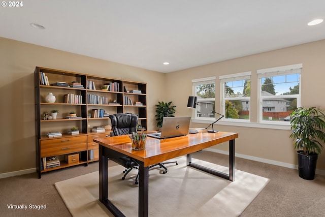 view of carpeted office space