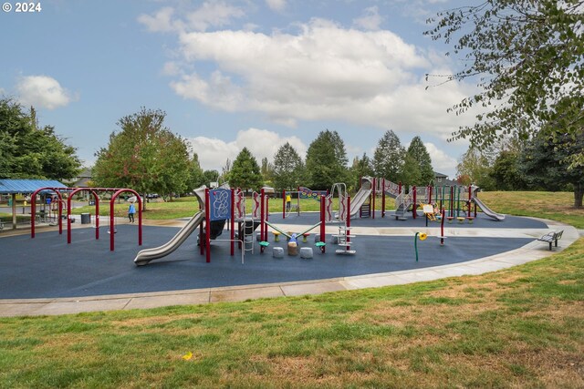 view of play area featuring a lawn