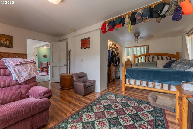 93777 Green Acres Ln, Coos Bay, OR 97420 - bedroom with wood finished floors, multiple windows, and a closet