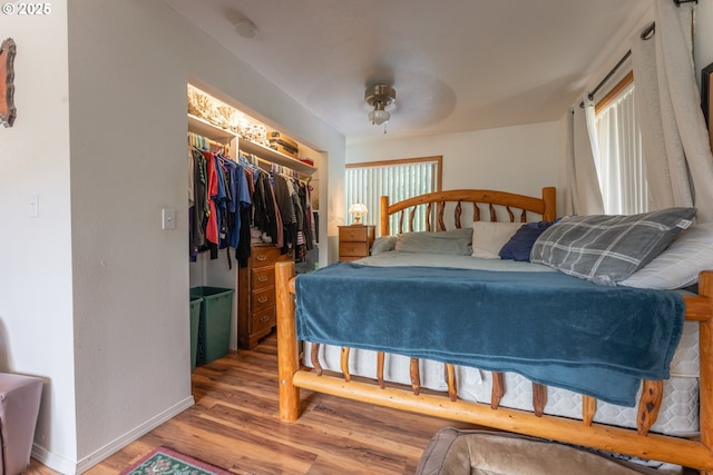93777 Green Acres Ln, Coos Bay, OR 97420 - bedroom with wood finished floors, a closet, and a walk in closet