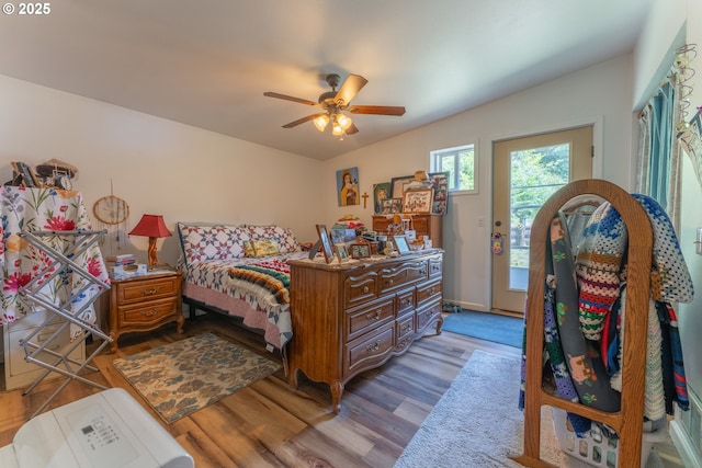 93777 Green Acres Ln, Coos Bay, OR 97420 - bedroom featuring access to outside, wood finished floors, and ceiling fan