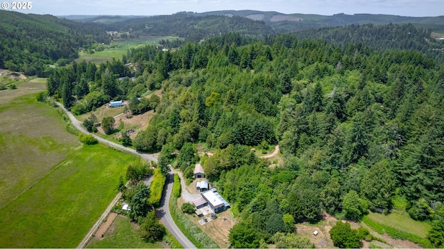 93777 Green Acres Ln, Coos Bay, OR 97420 - view of property location featuring a heavily wooded area and a mountain backdrop